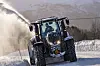 Snørydding med Valtra og snøfreser på en vei i Oppdal.