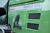 Nærbilde av grønn Fendt Favorit 926 traktor med logoen 'Dieselross'