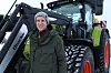 Tom Seyer, markedsansvarlig for de nordiske landene hos Claas, foran en Claas vinterstid