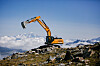 Gravemaskin på fjellet.