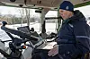 Roger Bjørneseth i traktorhytta med PC
