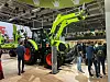 Claas Arion med ny-utviklet FL 140 C frontlaster fra MX på messeområdet